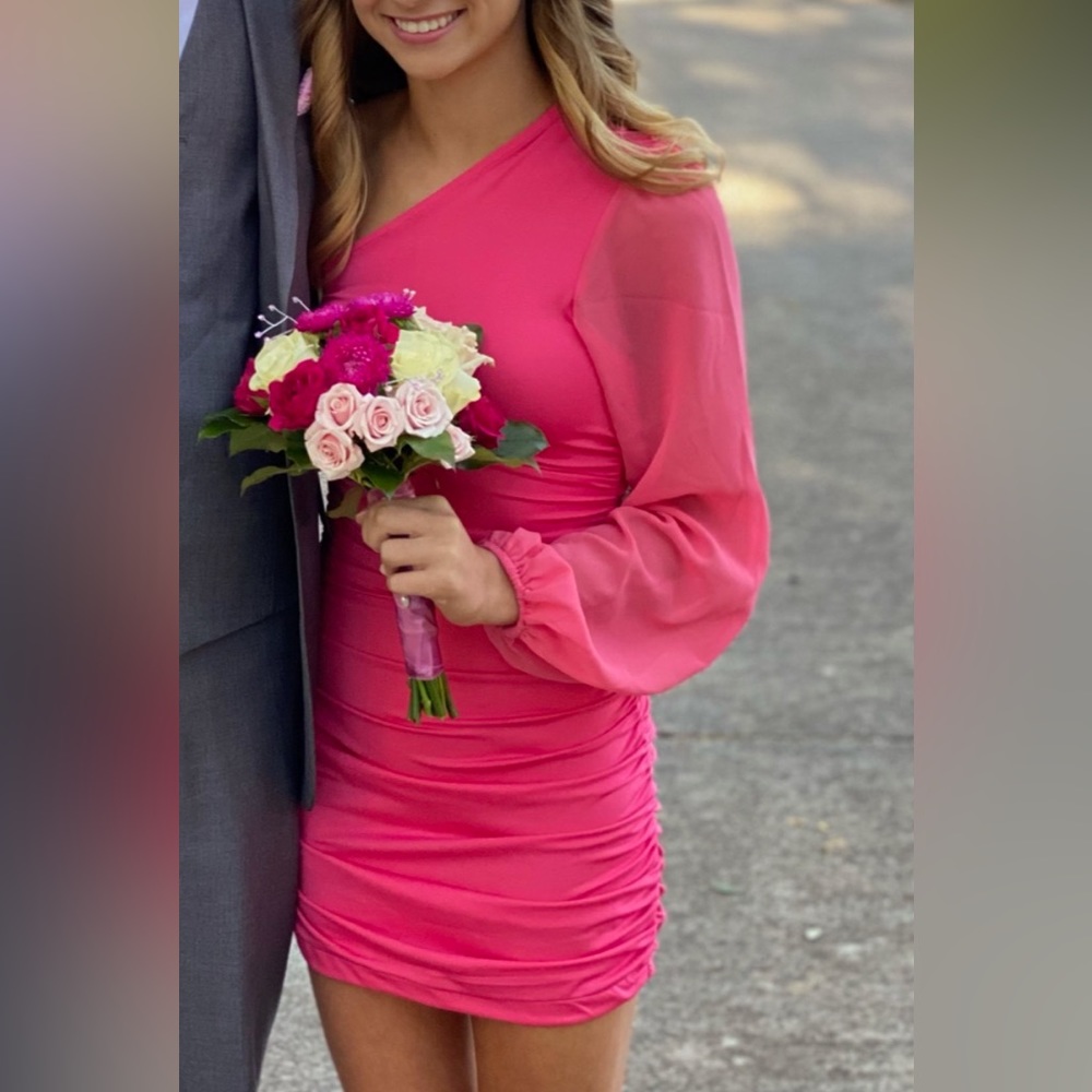 Last years homecoming dress, a size S but was altered so it fits more as a xs.